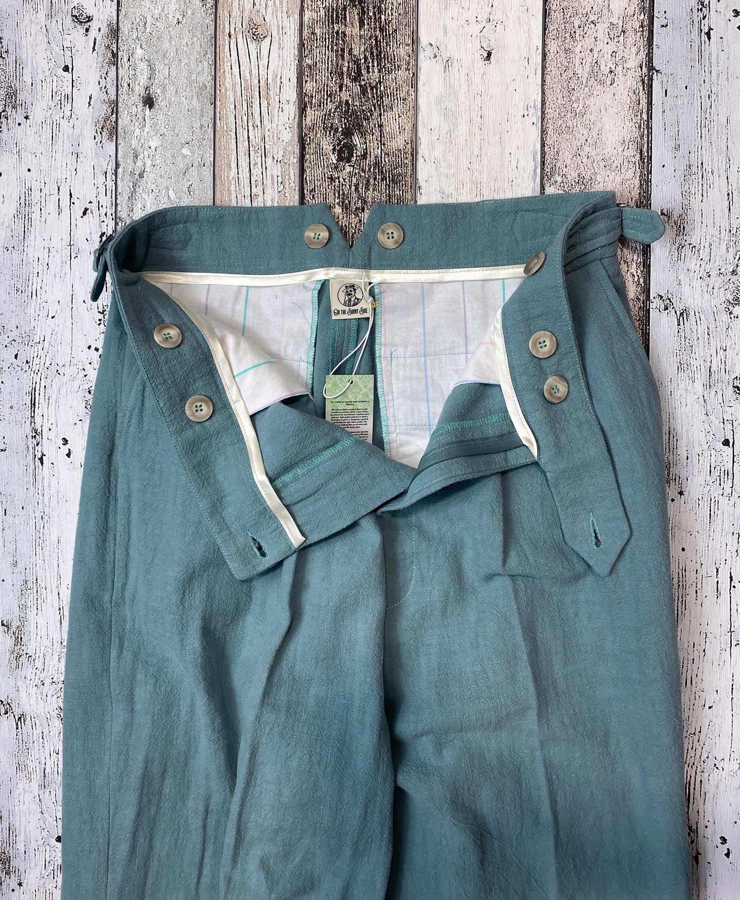 High waist trousers in vintage style in dark mint linen