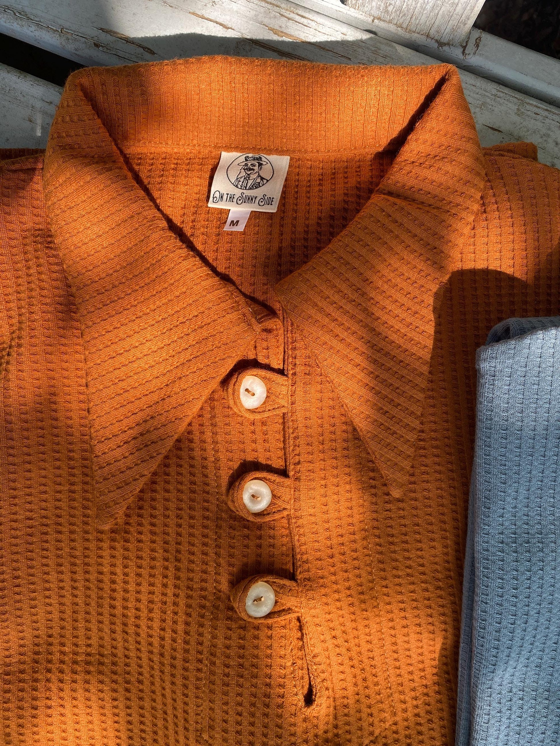 1930s style organic cotton polo shirt caramel brown orange