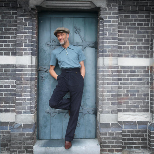 Vintage style men’s trousers made from cotton corduroy, featuring a high waist, wide legs, and front pleats, inspired by 1930s–1940s workwear.